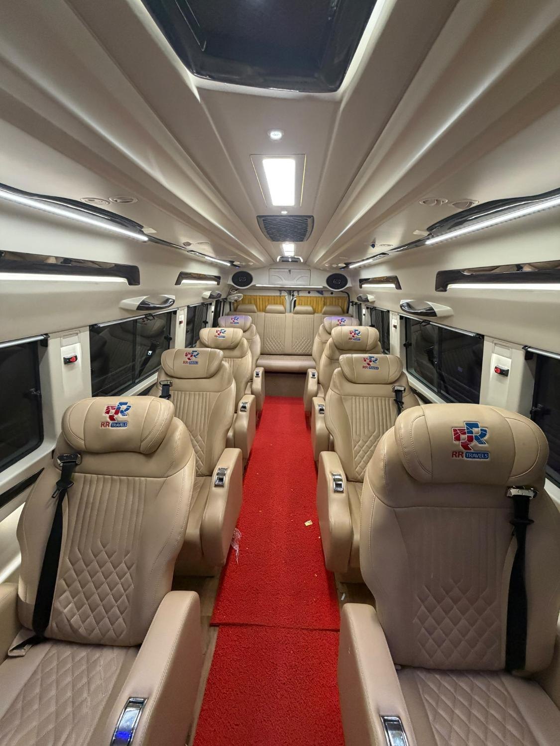Leather seats and a red aisle inside the Urbania Lux